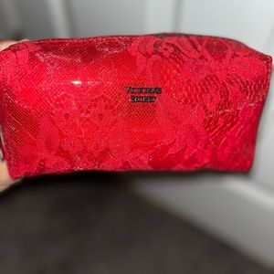 Red lace Victoria Secret makeup bag. Brand new.